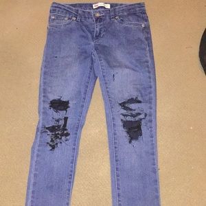 Ripped Levi Medium Wash Jeans